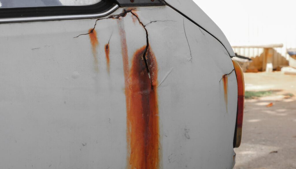 Rust on a white vehicle.